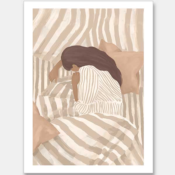 A woman in striped sleepwear curls under soft bedding in warm neutral tones. From the Lounging Ladies II collection by Urban Road.