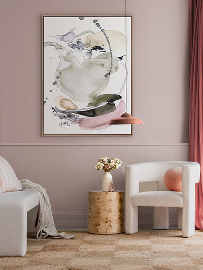 Forest Light abstract artwork against a blush wall styled with white and neutral furniture, checkered rug and pink curtains.
