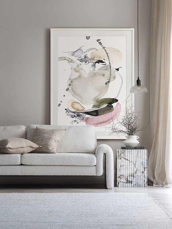 Forest Light abstract artwork against a blush wall styled with white and neutral furniture, checkered rug and pink curtains.