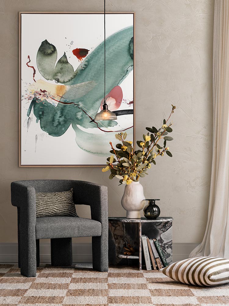 Hidden Cove 3 abstract art print styled with a green armchair with florals, patterned rug, curtains and a striped cushion.