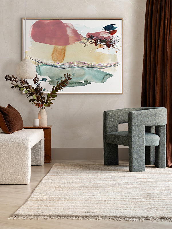 Hidden Cove 6 abstract art print styled in a modern room with neutral decor, rug, warm brown accents, and a green armchair.