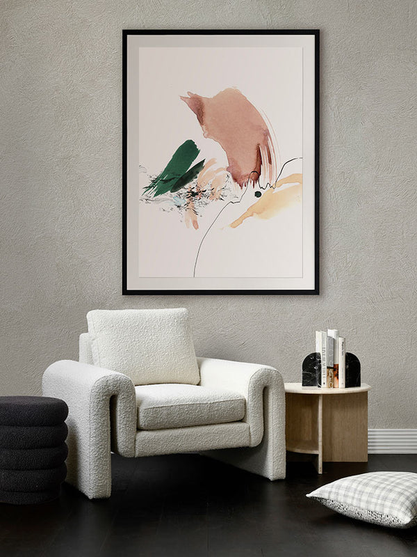 Setting Horizon styled in a neutral, soft living area with a beige sofa, brown side table, white rug and a dark cushion.