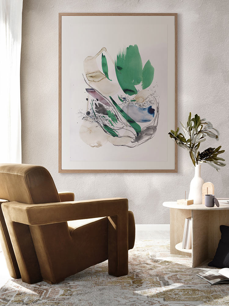 Unanticipated abstract art print styled in a cosy kids room with neutral decor, green curtains, white rug and pendant light.