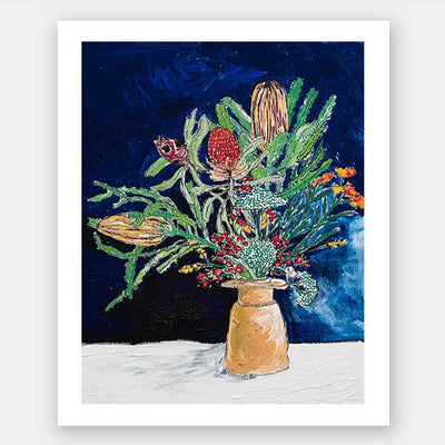 The Australian Wildflower Bouquet Unframed Art Print by Urban Road features a vibrant arrangement of textured Australian natives and greenery in a vase, set against a deep blue background with a white surface beneath.