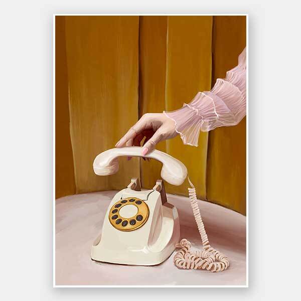 A hand in a sheer, ruffled pink sleeve lifts the receiver of a vintage cream rotary phone by a gold curtain—captured in the Out Of Office Unframed Art Print from Shaynna Blaze x Urban Road, perfect for retro-inspired spaces.