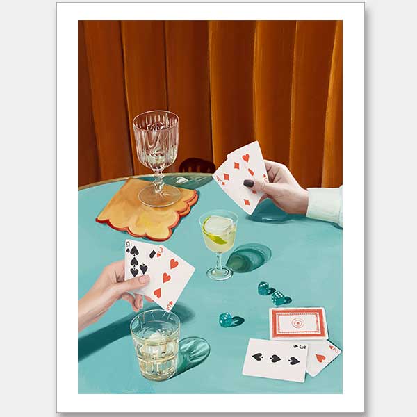 Two hands hold cards over a green table with drinks, dice, and poker chips in this vintage-style Deal Me In Unframed Art Print from the Shaynna Blaze x Urban Road collection, featuring dramatic shadows and an orange curtain.