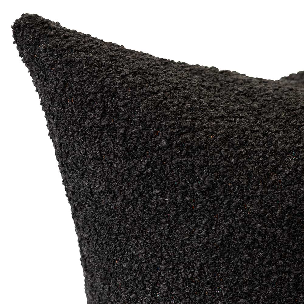 The Urban Road Emberwood Square Charcoal Cushion (50x50cm) features a soft, textured black fabric—an ideal accent to enhance any interior with a touch of luxury.