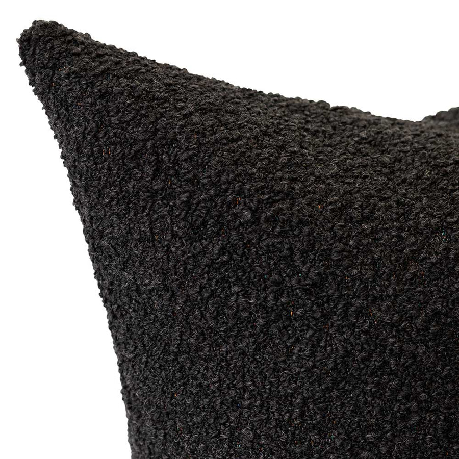 The Urban Road Emberwood Square Charcoal Cushion (50x50cm) features a soft, textured black fabric—an ideal accent to enhance any interior with a touch of luxury.