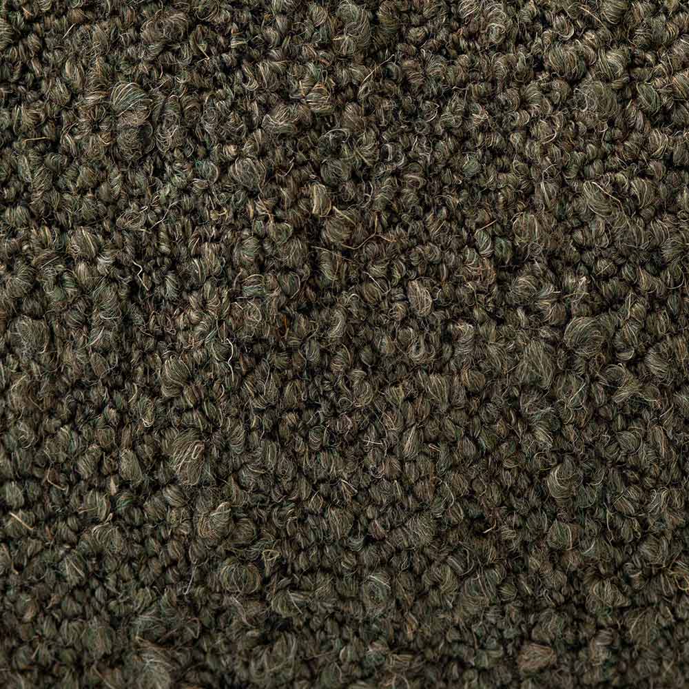 The Urban Road Virella Rectangle Green Cushion (90x30cm) is a luxury dark green cushion with a textured finish and slightly pointed corners, perfect for elevating any interior design. Shown on a white background.