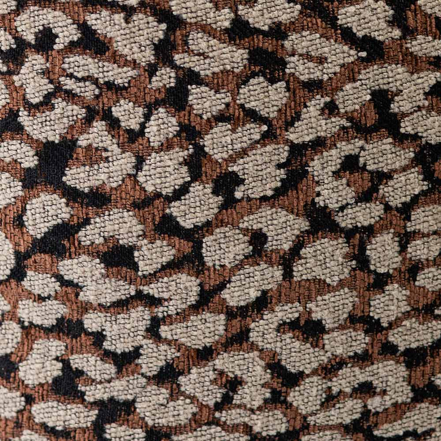 The Urban Road Foxshade Square Rust Cushion (50x50cm) features a luxury woven fabric with a brown, beige, and black abstract animal print, perfect for adding Darren Palmer-inspired style to your space. Shown against a white background.