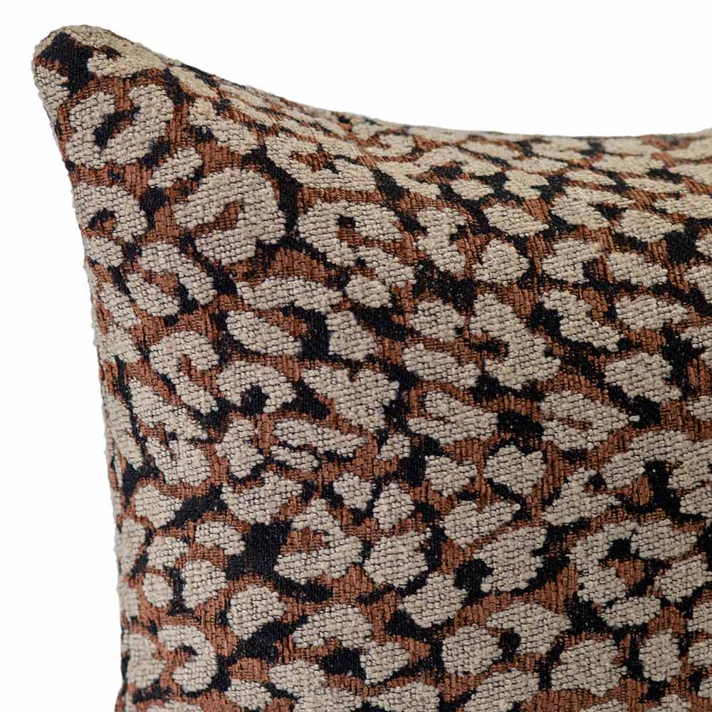 The Urban Road Foxshade Square Rust Cushion (50x50cm) features a luxury woven fabric with a brown, beige, and black abstract animal print, perfect for adding Darren Palmer-inspired style to your space. Shown against a white background.