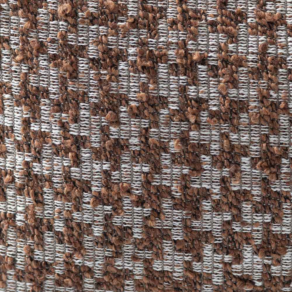 The Hearthstone Rectangle Rust Cushion by Urban Road (80x40cm) features a brown and white houndstooth pattern, pointed corners, and a luxe texture, making it a stylish accent inspired by Darren Palmer’s signature look.