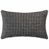 The Noirstone Lumbar Black-and-White Cushion by Urban Road (50x30cm) features a houndstooth pattern, ideal for enhancing interiors. Inspired by Darren Palmer and displayed on a crisp white background.