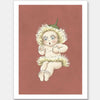 The Urban Road Gum Blossom Baby III Terracotta Unframed Art Print features a cartoon baby with large green eyes, rosy cheeks, and a dandelion-like flower costume, sitting and looking surprised against a terracotta background.