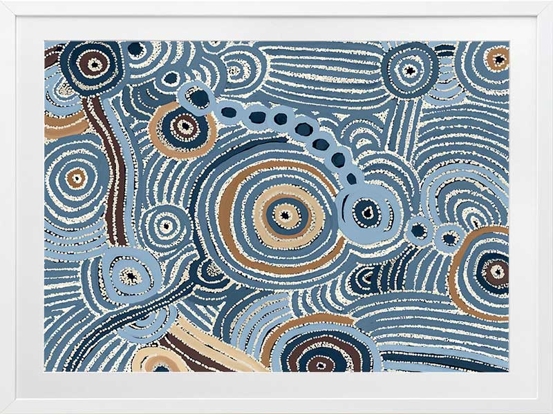 Concentric circle motifs and flowing white dot patterns in navy blue, sky blue, and ochre against a textured pale blue background. From the Maria Watson-Trudgett collection with Urban Road.