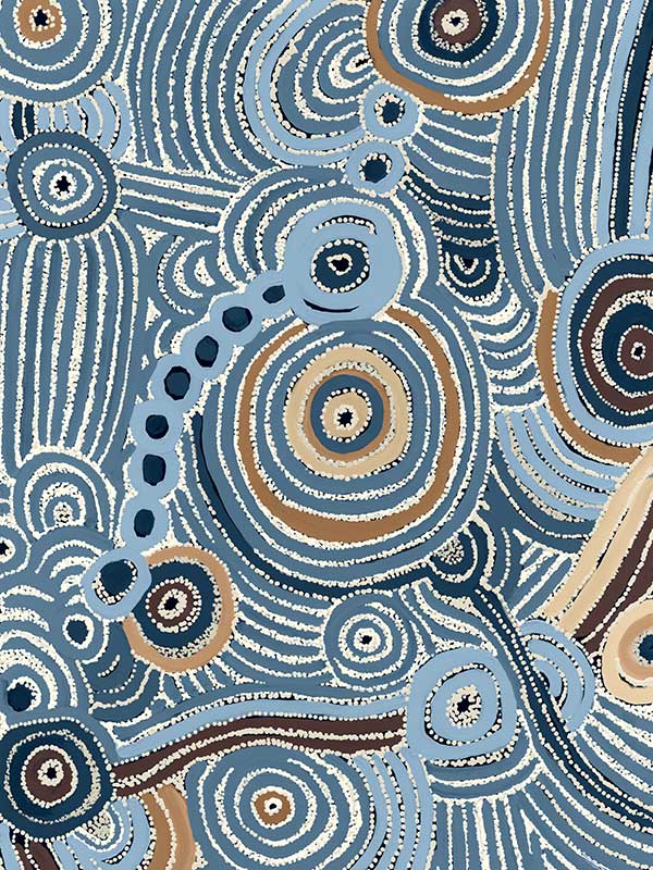 Concentric circle motifs and flowing white dot patterns in navy blue, sky blue, and ochre against a textured pale blue background. From the Maria Watson-Trudgett collection with Urban Road.