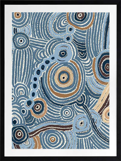 Concentric circle motifs and flowing white dot patterns in navy blue, sky blue, and ochre against a textured pale blue background. From the Maria Watson-Trudgett collection with Urban Road.