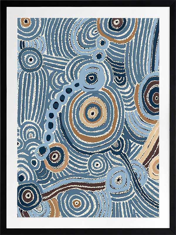 Concentric circle motifs and flowing white dot patterns in navy blue, sky blue, and ochre against a textured pale blue background. From the Maria Watson-Trudgett collection with Urban Road.