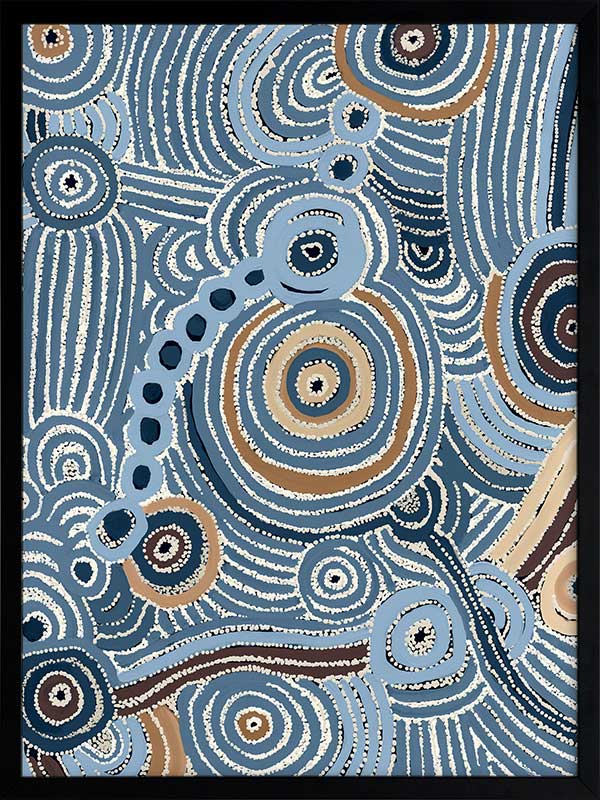 Concentric circle motifs and flowing white dot patterns in navy blue, sky blue, and ochre against a textured pale blue background. From the Maria Watson-Trudgett collection with Urban Road.