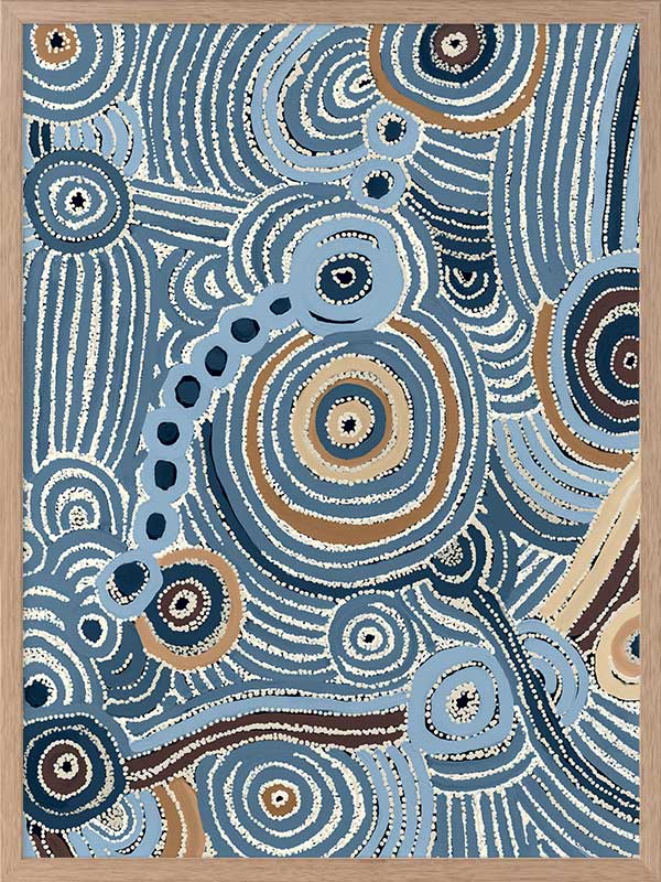 Concentric circle motifs and flowing white dot patterns in navy blue, sky blue, and ochre against a textured pale blue background. From the Maria Watson-Trudgett collection with Urban Road.