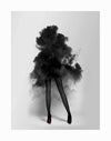 The Smokescreen Unframed Art Print by Urban Road features a person in high heels and sheer black stockings, their upper body hidden by dramatic smoke on a plain light gray background.