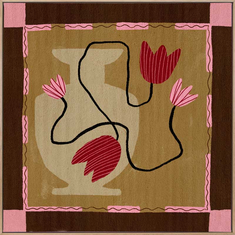 Abstract floral composition with red blooms on black curving stems over a camel and brown patchwork base, framed in soft pink, from the Shatha collection with Urban Road.