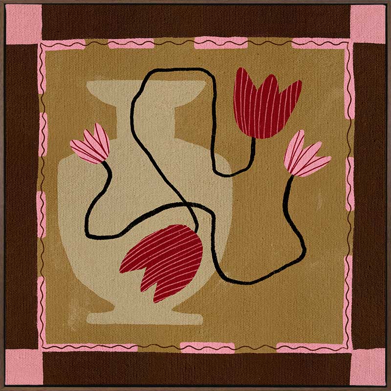 Abstract floral composition with red blooms on black curving stems over a camel and brown patchwork base, framed in soft pink, from the Shatha collection with Urban Road.