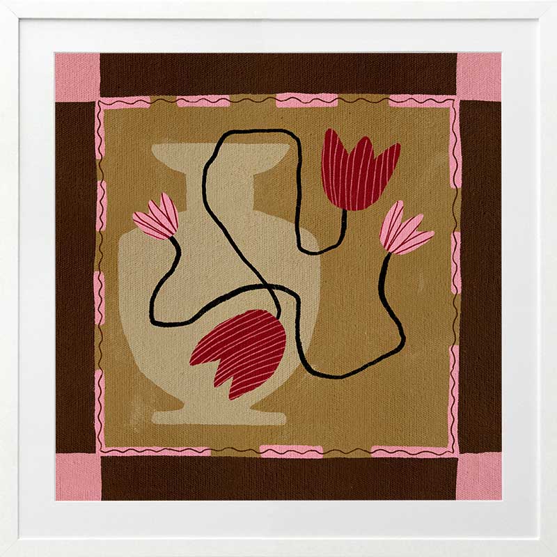 Abstract floral composition with red blooms on black curving stems over a camel and brown patchwork base, framed in soft pink, from the Shatha collection with Urban Road.