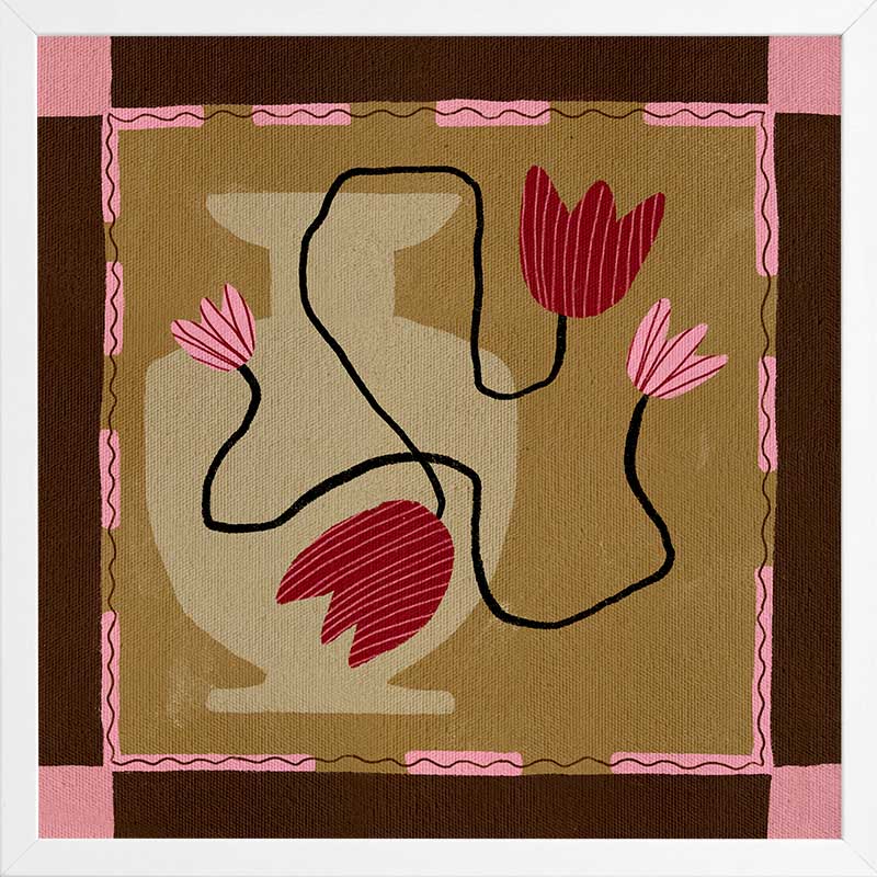 Abstract floral composition with red blooms on black curving stems over a camel and brown patchwork base, framed in soft pink, from the Shatha collection with Urban Road.