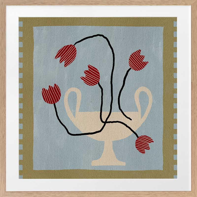 Whimsical arrangement of red abstract blooms in a cream pedestal vase set on a light blue and green checkered background, from the Shatha collection with Urban Road.