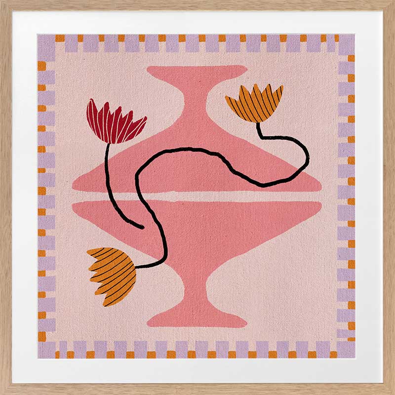 Playful pink and coral composition with a pedestal vase holding yellow and red blooms, framed by a lavender and pink checkered border, from the Shatha collection with Urban Road.