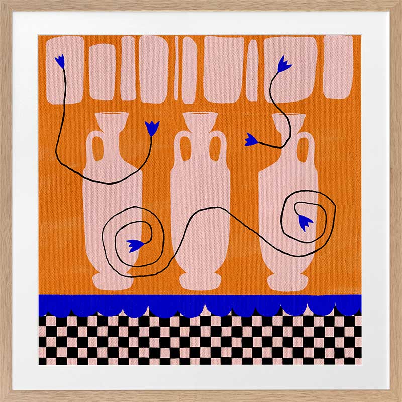 Vibrant orange background with soft peach vases, electric blue and black floral accents, and a black-and-pink checkered lower border, from the Shatha collection with Urban Road.