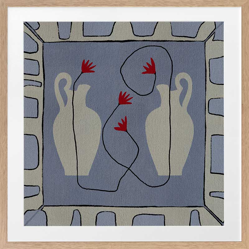 Duo of pale blue vases with bright red flowers, arranged over a denim-toned background and framed in blue and white block patterning, from the Shatha collection with Urban Road.