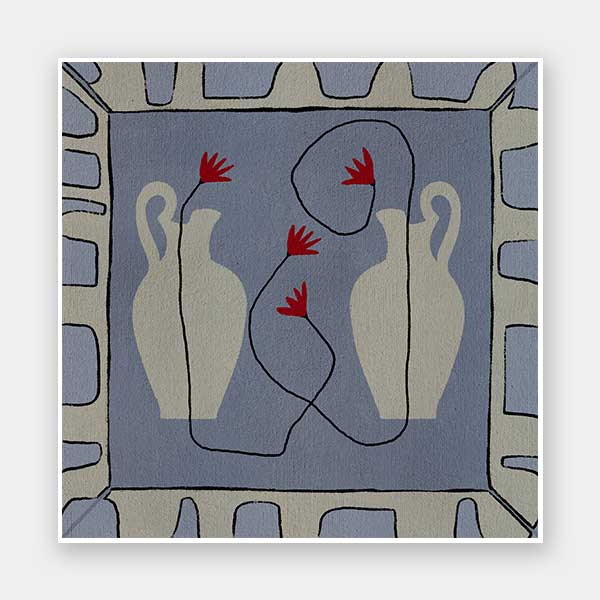 Duo of pale blue vases with bright red flowers, arranged over a denim-toned background and framed in blue and white block patterning, from the Shatha collection with Urban Road.