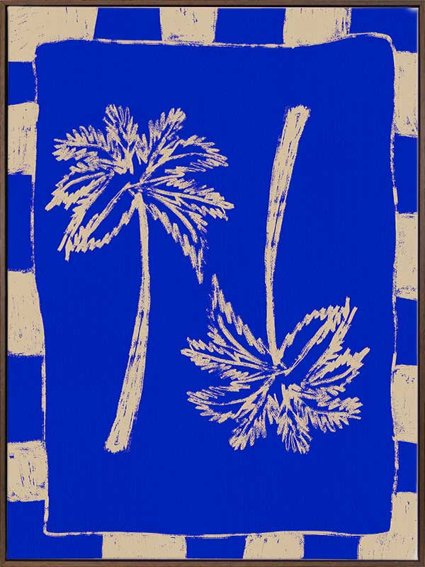 Vibrant coastal-inspired artwork featuring two cream palm trees with sweeping fronds on a bold cobalt blue background with a striped border, from the Shatha collection with Urban Road.