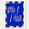 Vibrant coastal-inspired artwork featuring two cream palm trees with sweeping fronds on a bold cobalt blue background with a striped border, from the Shatha collection with Urban Road.
