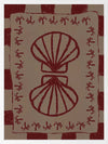 Mirrored burgundy seashell design with curved botanical accents, set on a brown background with a bold burgundy striped border, from the Shatha collection with Urban Road.
