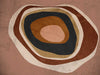 Concentric circle wall art from the Tim Neve collection by Urban Road, with layered brown, caramel, and cream tones.
