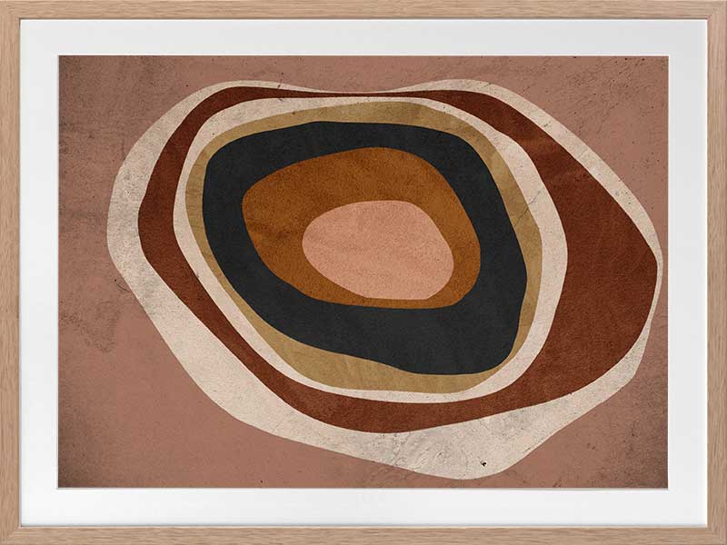 Concentric circle wall art from the Tim Neve collection by Urban Road, with layered brown, caramel, and cream tones.
