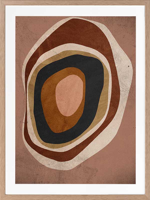 Concentric circle wall art from the Tim Neve collection by Urban Road, with layered brown, caramel, and cream tones.
