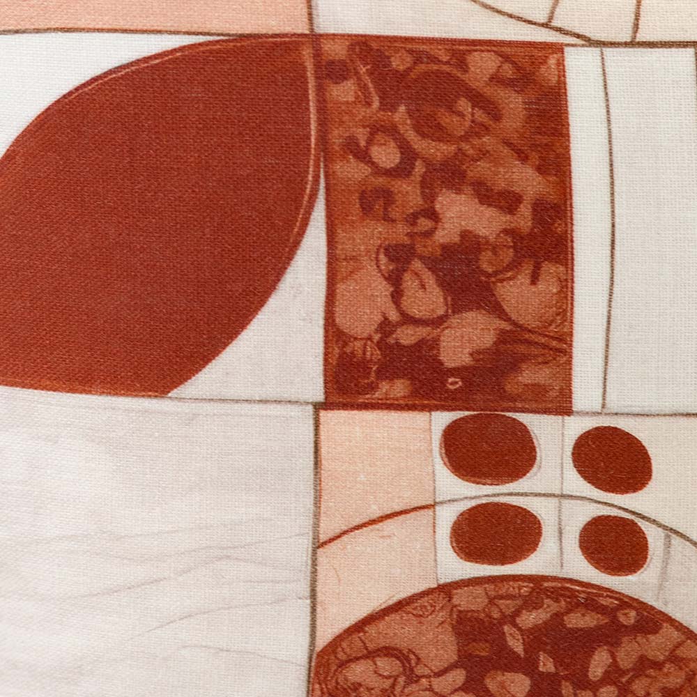 Cushion from the Tim Neve collection by Urban Road, with a patchwork of soft organic shapes in warm earthy tones.