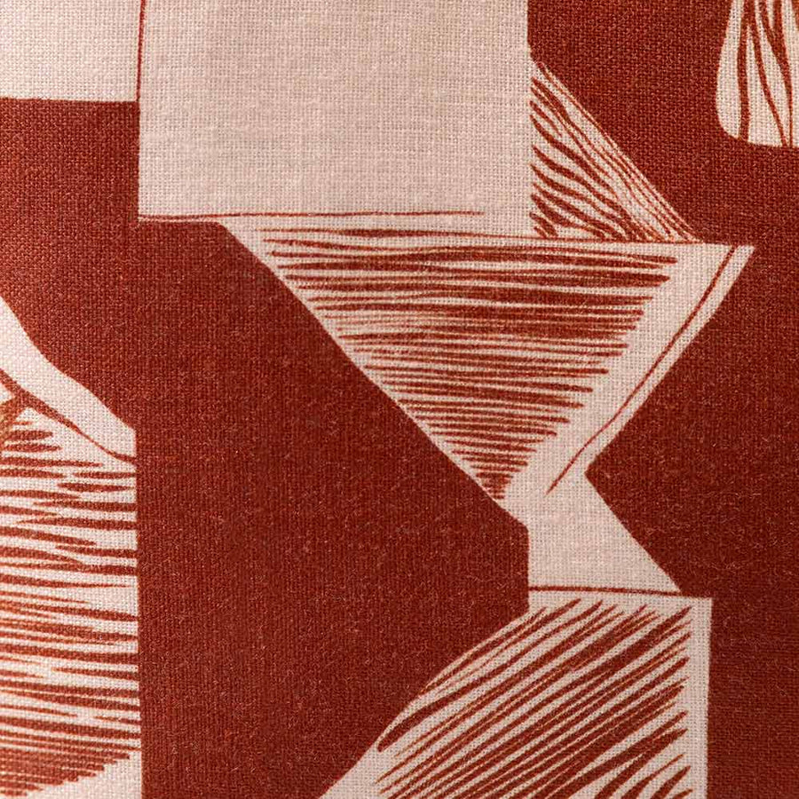 Cushion from the Tim Neve collection by Urban Road, featuring a peachy abstract design with soft curved lines and warm undertones.