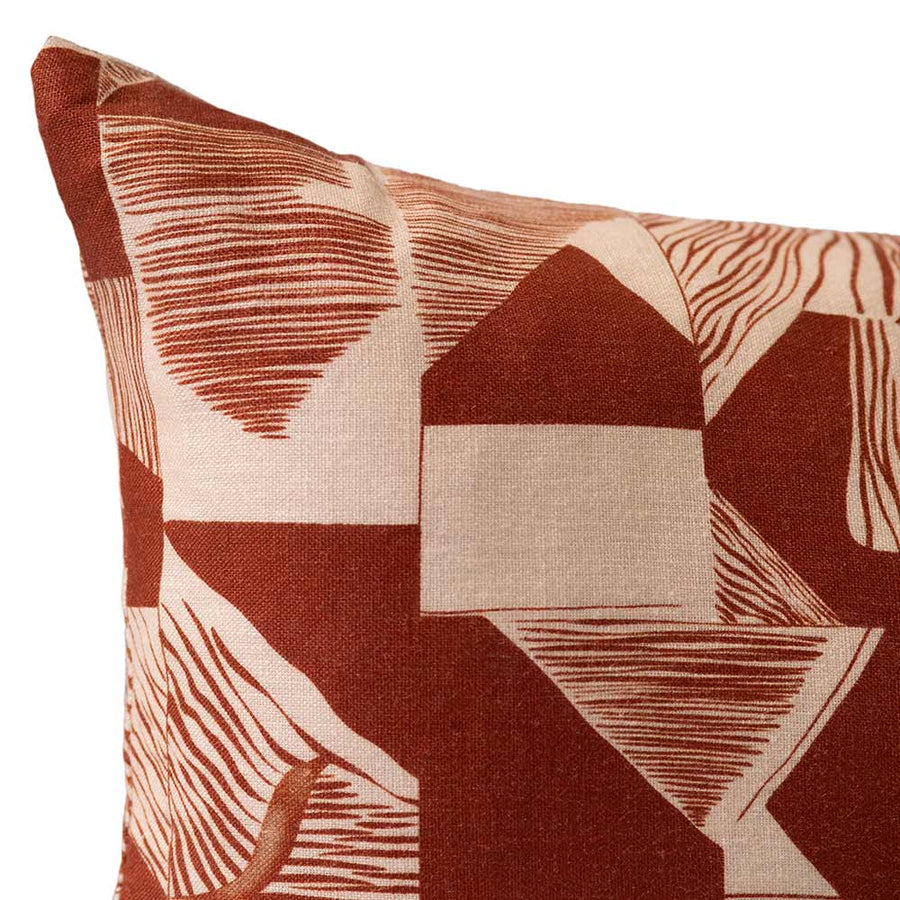 Cushion from the Tim Neve collection by Urban Road, featuring a peachy abstract design with soft curved lines and warm undertones.