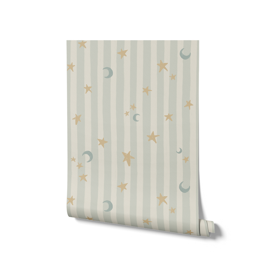 Vertical pinstripes sprinkled with crescent moons and tiny stars on pale blue, from the Little Tails Collection by Urban Road.