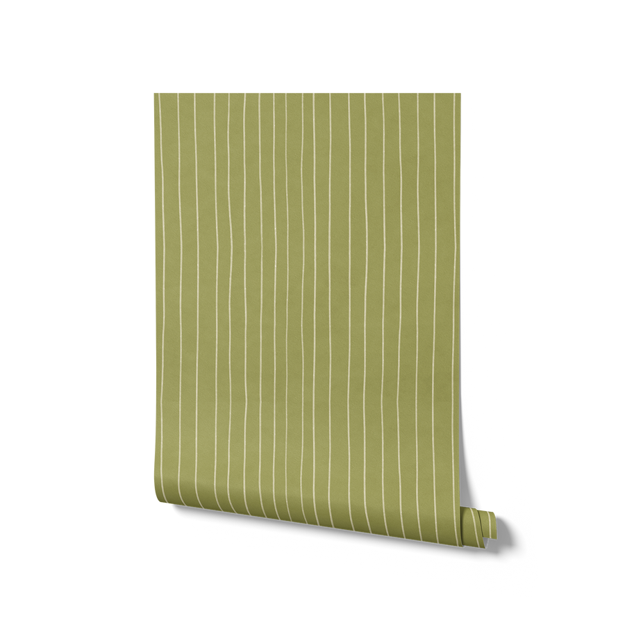 Hand-drawn wavy vertical stripes with a gentle sketchy feel on green, from the Little Tails Collection by Urban Road.