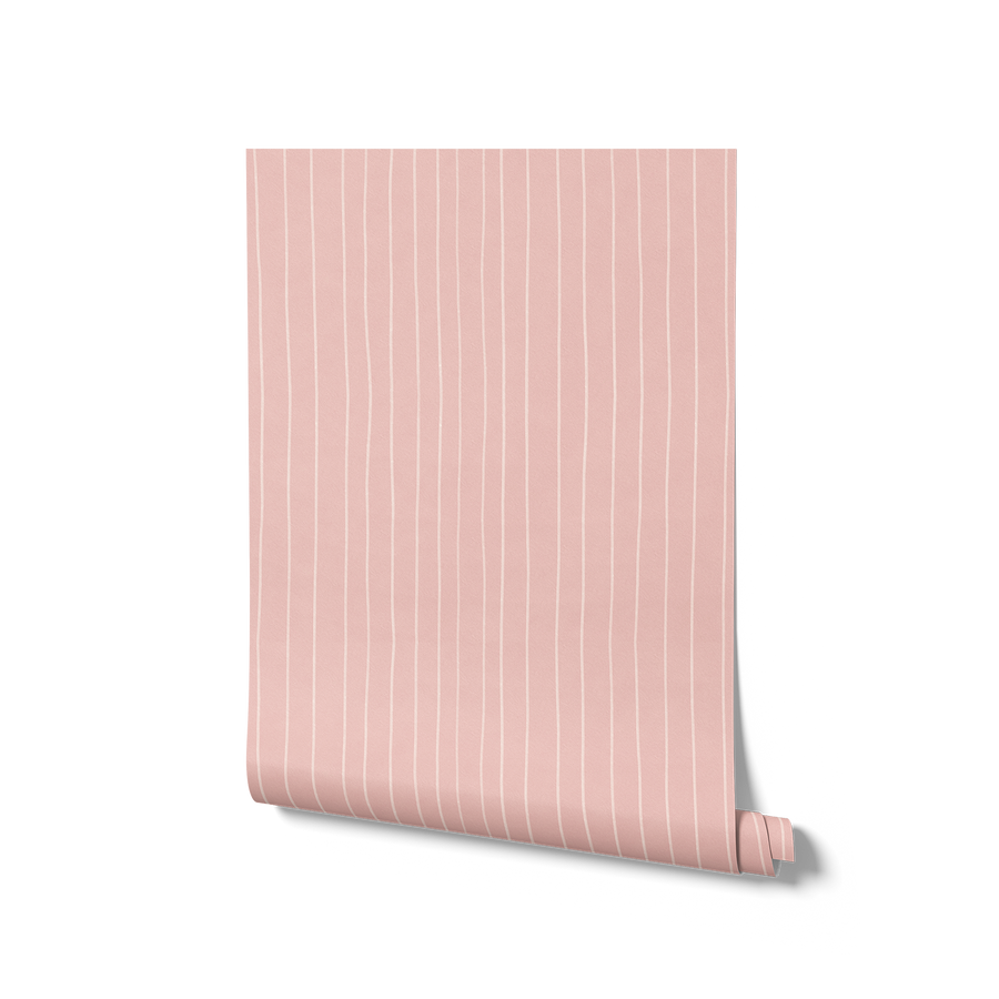 Hand-drawn wavy vertical stripes with a gentle sketchy feel on pink, from the Little Tails Collection by Urban Road.
