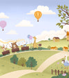 Vibrant countryside with animal friends riding a toy train under colourful hot air balloons, from the Little Tails Collection by Urban Road.