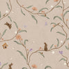 Taupe wallpaper of trailing branches with tiny rabbits, blossoms and birdhouses, from the Little Tails Collection by Urban Road.
