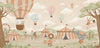 Pastel circus fair with hot air balloons, striped tents and playful animal performers, from the Little Tails Collection by Urban Road.